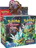 A display box of Pokémon trading card game booster packs, featuring artwork from the 'Maskerade im Zwielicht' set. Produktbild-Vorschau
