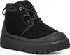 A black UGG boot is shown against a white background. Voir les images du produit