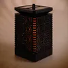 A black solar lantern with a flame effect. Podgląd zdjęcia produktu