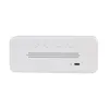 The back view of a white digital alarm clock with buttons and a speaker grille. Anteprima dell’immagine prodotto