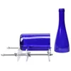A blue glass bottle and a bottle cutter on a white background. Anteprima dell’immagine prodotto