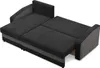 A black and gray sectional sofa is shown in an open position, revealing its sleeping function. Produktbild-Vorschau