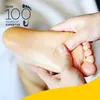A close-up of a foot receiving a massage, with text overlay indicating "OVER 100 YEARS OF EXPERTISE". Náhled obrázku produktu