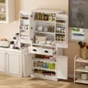 A well-lit interior scene of a white kitchen pantry filled with various food items and appliances. Podgląd zdjęcia produktu