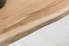 A close-up view of the edge of a wooden table with a natural, live edge. Produktbild-Vorschau