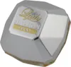 A close-up, studio shot of a perfume bottle cap. Produktbild-Vorschau