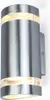 A silver-colored outdoor wall light with two light sources, mounted on a white wall. Produktbild-Vorschau