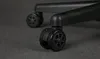 Close-up of the casters of a black office chair. Produktbild-Vorschau