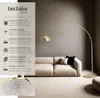 A living room scene with a sofa and a floor lamp. Náhled obrázku produktu