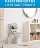 A bathroom scene with a toilet, shelving unit, and decorative items. Produktbild-Vorschau