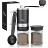 A manual coffee grinder set with its packaging and accessories, displayed against a white background. Anteprima dell’immagine prodotto