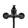 A black faucet with a shower hose attached, shown against a white background. Produktbild-Vorschau