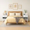 A bedroom scene with a bed, nightstands, and wall art. Náhled obrázku produktu