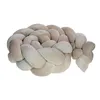 A braided pillow or bed bumper. Produktbild-Vorschau