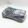A bundle of trash grabbers in plastic packaging. Produktbild-Vorschau