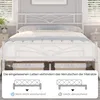 A white metal bed frame with a mattress and bedding, shown in a bedroom setting with windows and nightstands. Produktbild-Vorschau