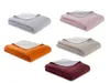 Five folded blankets in different colors are displayed against a white background. Náhled obrázku produktu