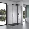 A modern bathroom with a black-framed glass shower enclosure. Produktbild-Vorschau