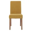 A single yellow dining chair with wooden legs against a white background. Náhled obrázku produktu