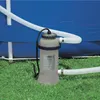 A pool heater connected to an above-ground pool, sitting on grass. Anteprima dell’immagine prodotto