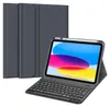 A tablet with a keyboard case and stylus is displayed against a white background.