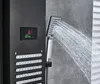 A modern black stainless steel shower panel with a digital display and a hand-held showerhead spraying water. Náhľad obrázku produktu