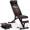 A black and red adjustable weight bench with a separate footrest accessory, shown on a white background. Produktbild-Vorschau