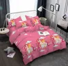 A pink unicorn-themed duvet cover and pillowcases are neatly arranged on a bed. Produktbild-Vorschau