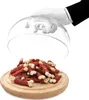 A hand in a white glove is lifting a glass cloche to reveal a pile of dog treats on a wooden board. Anteprima dell’immagine prodotto