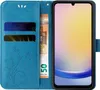 A blue flip phone case with floral and butterfly embossing, showing two credit cards and a 50 Euro banknote inserted. Produktbild-Vorschau