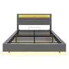 A grey upholstered bed frame with a yellow LED light strip in the headboard, shown from the front on a white background. Anteprima dell’immagine prodotto