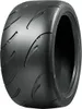 A close-up studio shot of a single black tire. Podgląd zdjęcia produktu