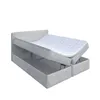 A bed with its storage compartment open, showing the mattress lifted. Produktbild-Vorschau