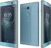 Three views of a blue Sony Xperia XA2 smartphone are displayed against a light gray background. Produktbild-Vorschau