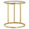 A studio shot of a round side table with a glass top and a gold metal frame. Podgląd zdjęcia produktu