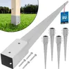 A product image showing metal ground post anchors and a wooden post in grass. Náhled obrázku produktu