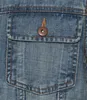 A close-up view of a denim jacket pocket with a button. Produktbild-Vorschau
