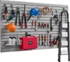 A wall-mounted tool organizer system with various tools and accessories displayed. Náhled obrázku produktu
