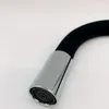 A close-up shot of the spout of a black flexible kitchen faucet with a chrome finish. Náhľad obrázku produktu