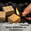 A hand lighting a fire starter cube on charcoal. Produktbild-Vorschau
