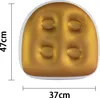 An inflatable, gold-colored seat with four suction cups, shown with dimensions indicated. Produktbild-Vorschau