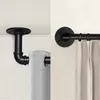 A split image showing two different ways to install a curtain rod. The left side shows a ceiling-mounted rod, and the right side shows a wall-mounted rod. Produktbild-Vorschau