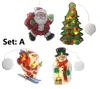 Set aus vier Weihnachtsfensterlichtern: Weihnachtsmann, Weihnachtsbaum, Ski fahrender Weihnachtsmann und Schneemann, alle beleuchtet Productafbeelding-voorbeeld