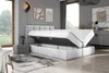 A bedroom scene with a bed that has its storage compartment open. Produktbild-Vorschau