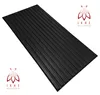 A black, ribbed panel is shown at an angle on a white background, with two logos in the upper right and lower left corners. Náhled obrázku produktu