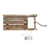 A wooden decorative sled with LED lights. Voir les images du produit