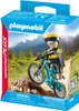 A Playmobil mountain biker toy set packaging, showing the toy figure on a mountain bike in a scenic mountain background. Produktbild-Vorschau