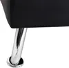 A close-up view of the bottom corner of a black sofa, showing one of its chrome legs. Produktbild-Vorschau