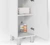 An open white cabinet with shelves, displaying folded towels and toiletries. Podgląd zdjęcia produktu