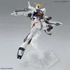A model of a Gundam robot in a dynamic pose, held up by a clear plastic stand. Anteprima dell’immagine prodotto